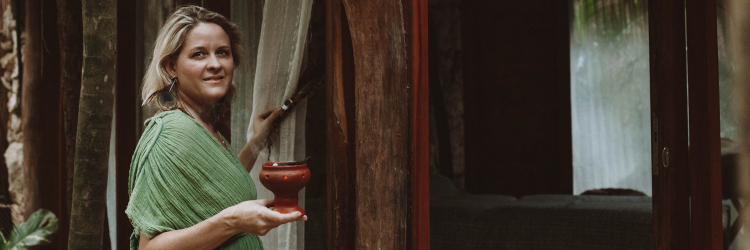 Kirsty Kaal holding a copalera after a sacred cleansing limpia during a luxury hotel residency at Habitas